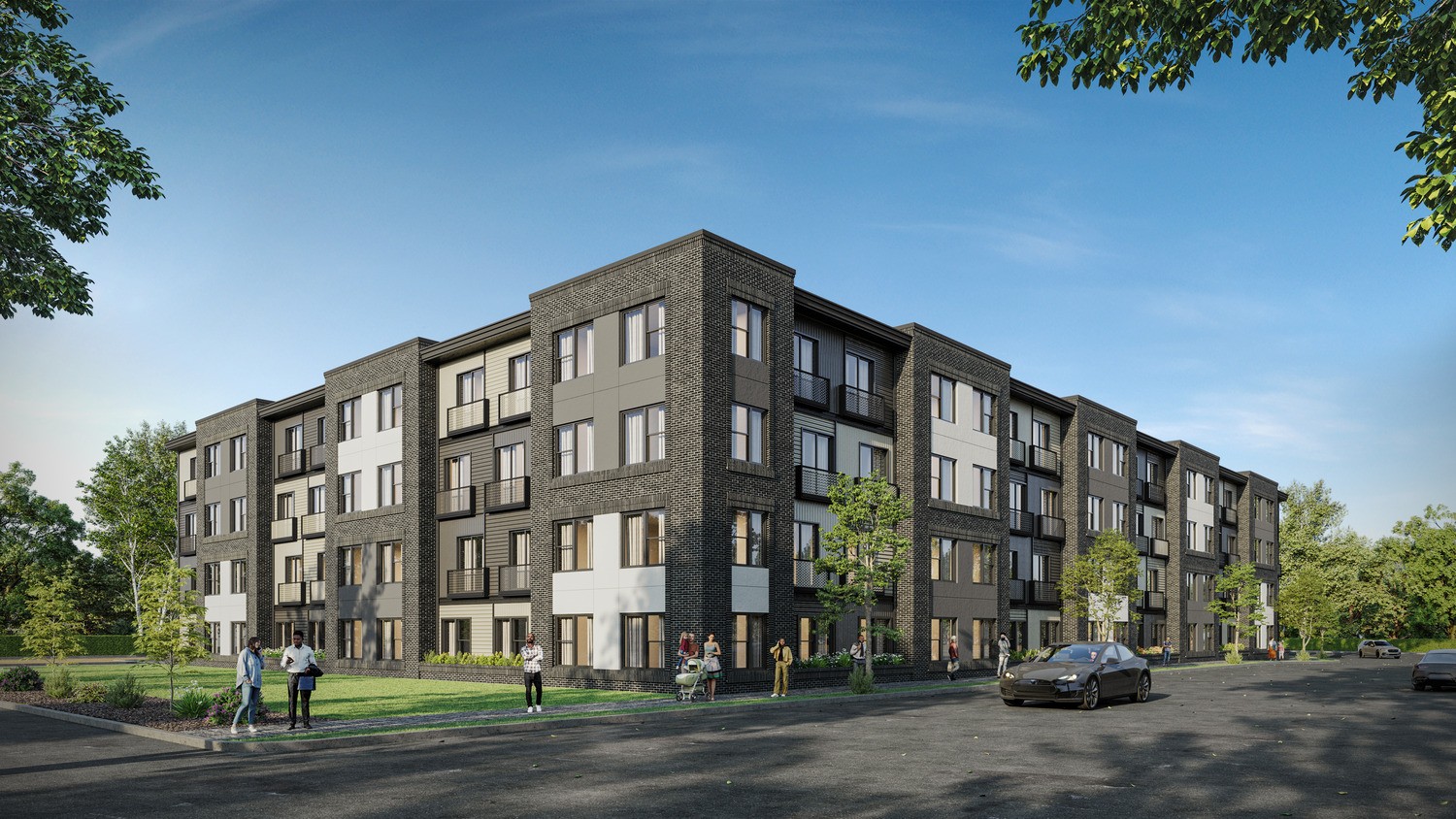 A modern apartment complex with a parking lot in front.